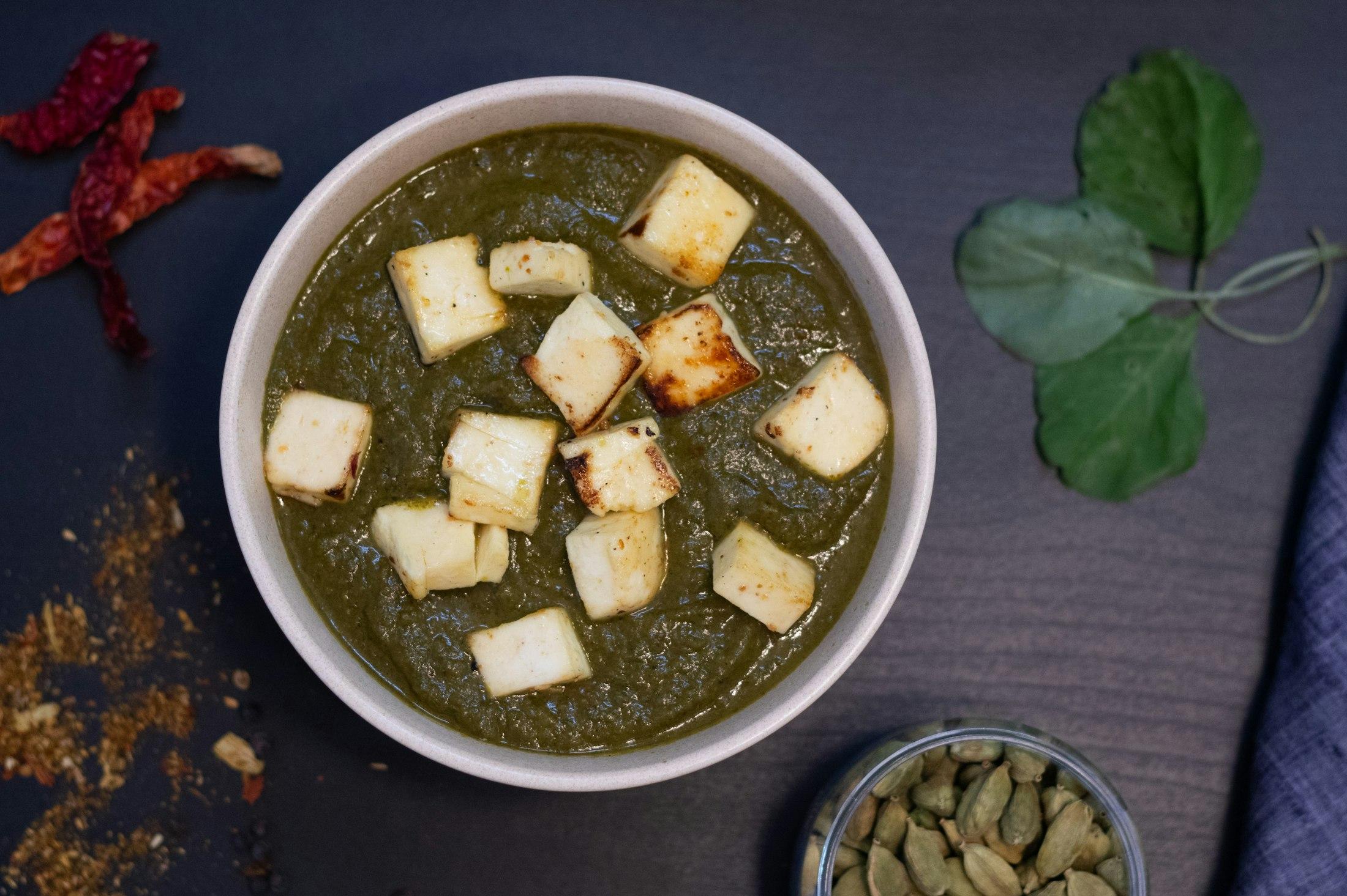 A bowl of palak paneer